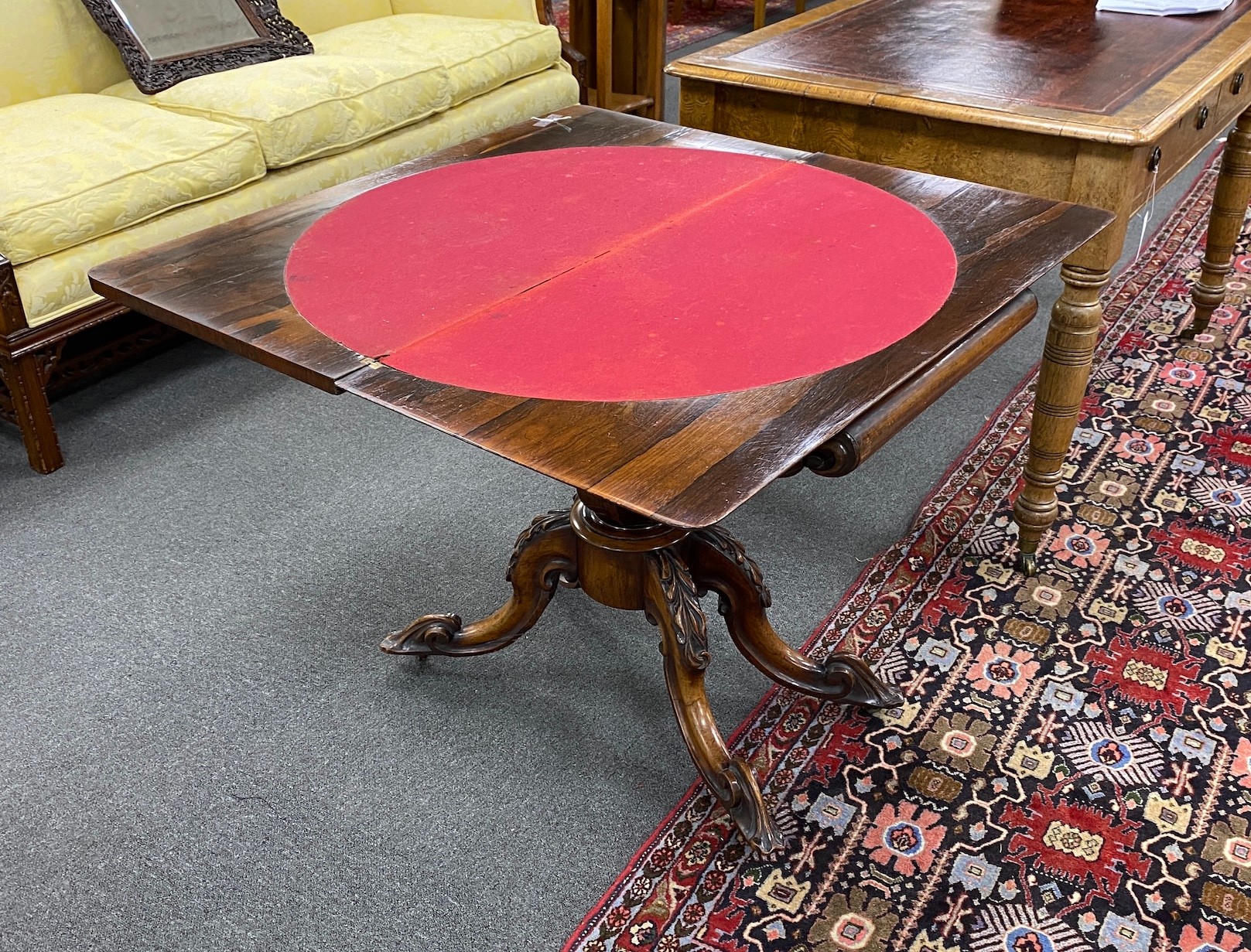 An early Victorian rectangular rosewood folding card table width 92cm, depth 45cm, height 73cm